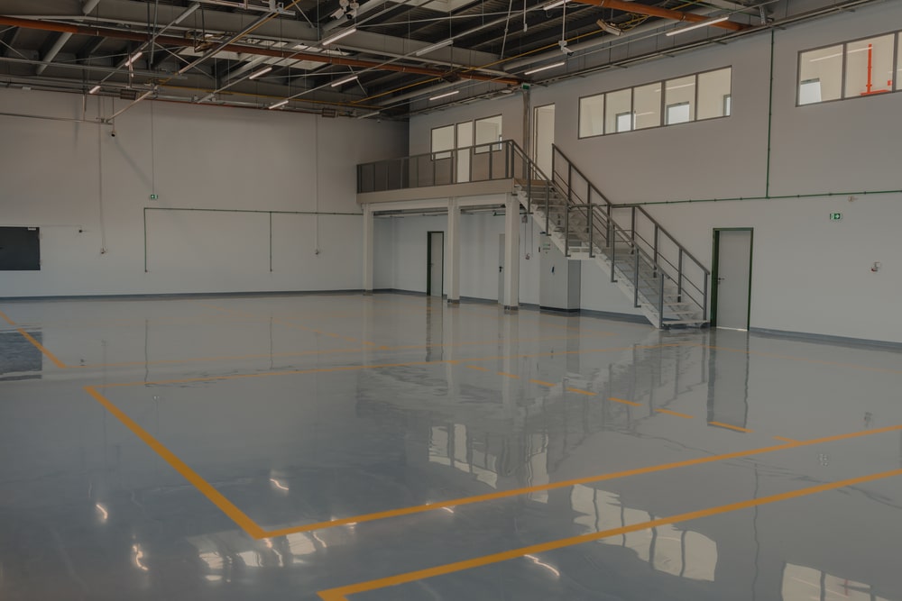Epoxy,And,Waxed,Flooring,With,Colorful,Signage,In,Car,Service.