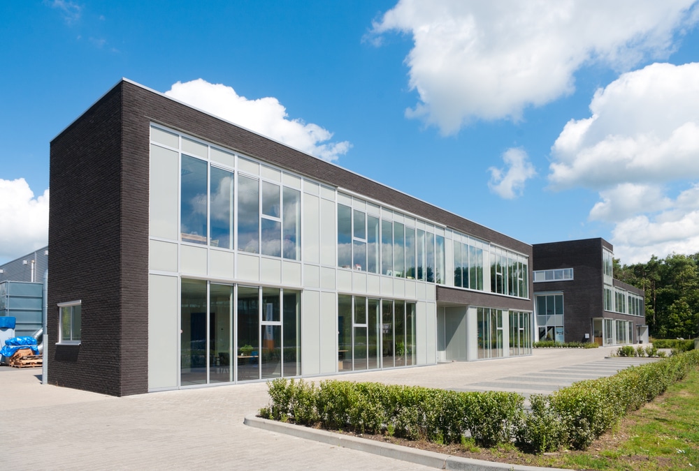 Small,Modern,Office,Building,Against,A,Nice,Cloudy,Sky